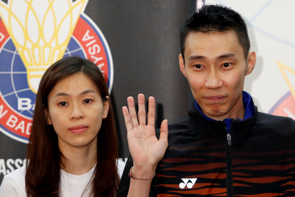 Datuk Lee Chong Wei poses with his wife Datin Wong Mew Choo after a news conference to announce his retirement in Putrajaya June 13, 2019. u00e2u20acu201d Reuters pic