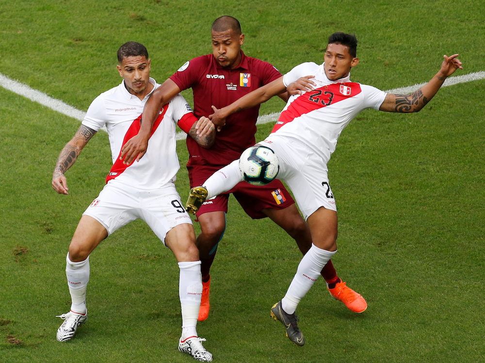 Peruu00e2u20acu2122s Paolo Guerrero and Christofer Gonzales in action with Venezuelau00e2u20acu2122s Salomon Rondon during their Copa America 2019 Group A match at Arena Do Gremio in Porto Alegre, Brazil June 15, 2019. u00e2u20acu201d Reuters pic