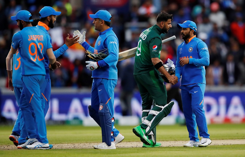 India players celebrate after the match against Pakistan at the Emirates Old Trafford stadium in Manchester June 16, 2019. u00e2u20acu201d Action Images via Reuters 