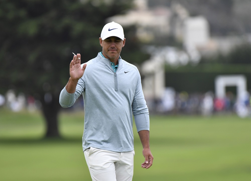 Brooks Koepka waves to the crowd on the 18th green during the final round of the 2019 US Open golf tournament at Pebble Beach Golf Links June 16, 2019. u00e2u20acu201d Picture by Michael Madrid-USA TODAY Sports via Reuters