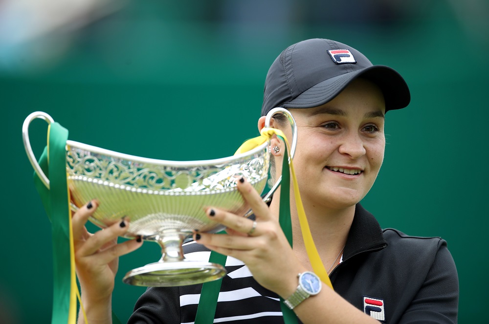 Australiau00e2u20acu2122s Ashleigh Barty poses as she celebrates winning the final against Germanyu00e2u20acu2122s Julia Goerges with the trophy at Edgbaston Priory Club in Birmingham June 23, 2019. u00e2u20acu201d Action Images via Reuters