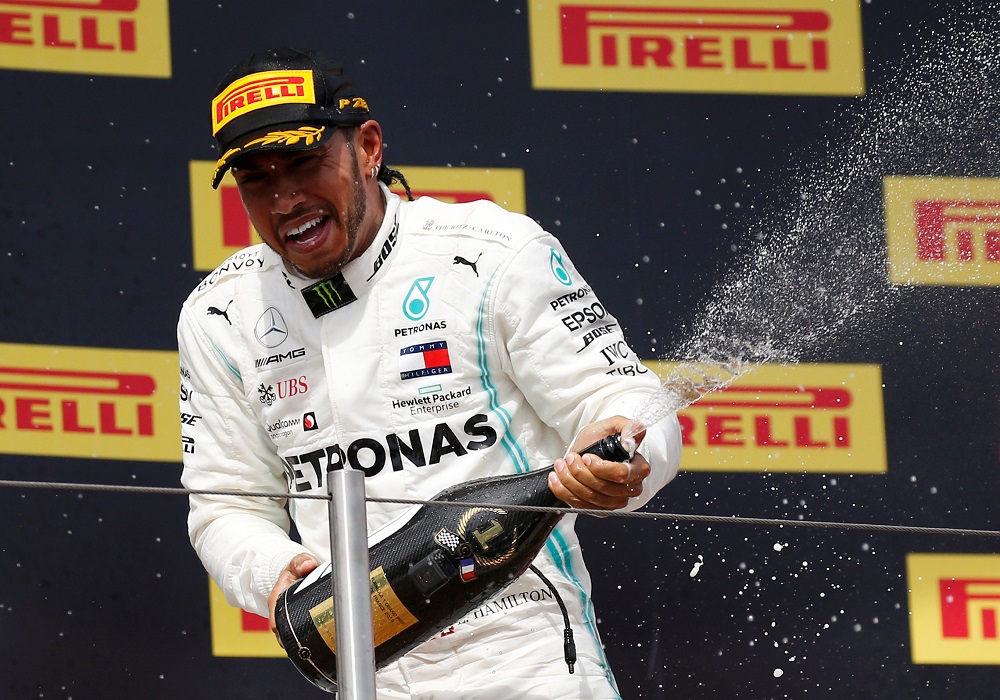 Mercedesu00e2u20acu2122 Lewis Hamilton celebrates with sparkling wine on the podium after winning the race at the French Grand Prix in Le Castellet June 23, 2019. u00e2u20acu201d Reuters pic