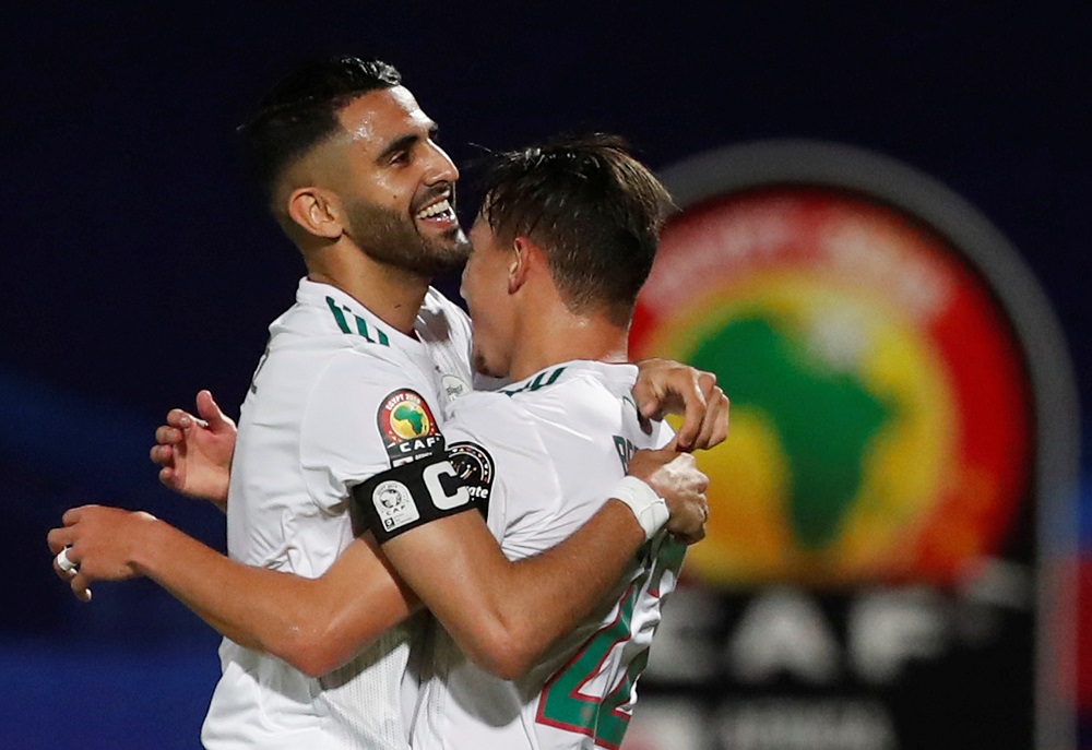 Algeriau00e2u20acu2122s Riyad Mahrez celebrates scoring their second goal with Ismael Bennacer at the 30 June Stadium in Cairo June 23, 2019. u00e2u20acu201d Reuters pic