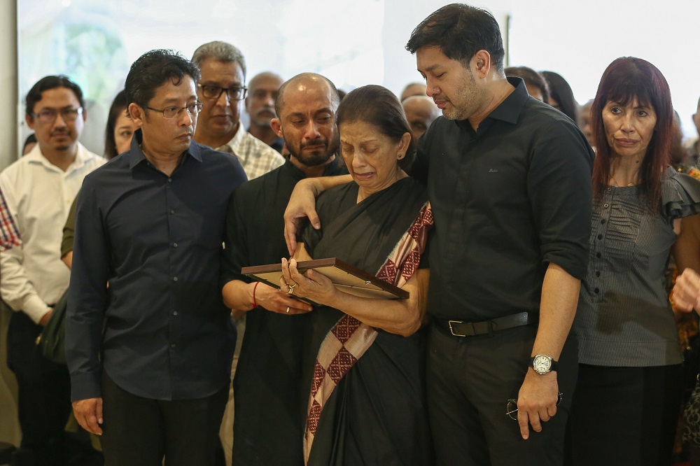 Puan Sri Rathi Khoo with her sons (from left) Eddin, Mavin and Rubin at the Nirvana Memorial in Shah Alam June 1, 2019. u00e2u20acu201d Picture by Yusof Mat Isa