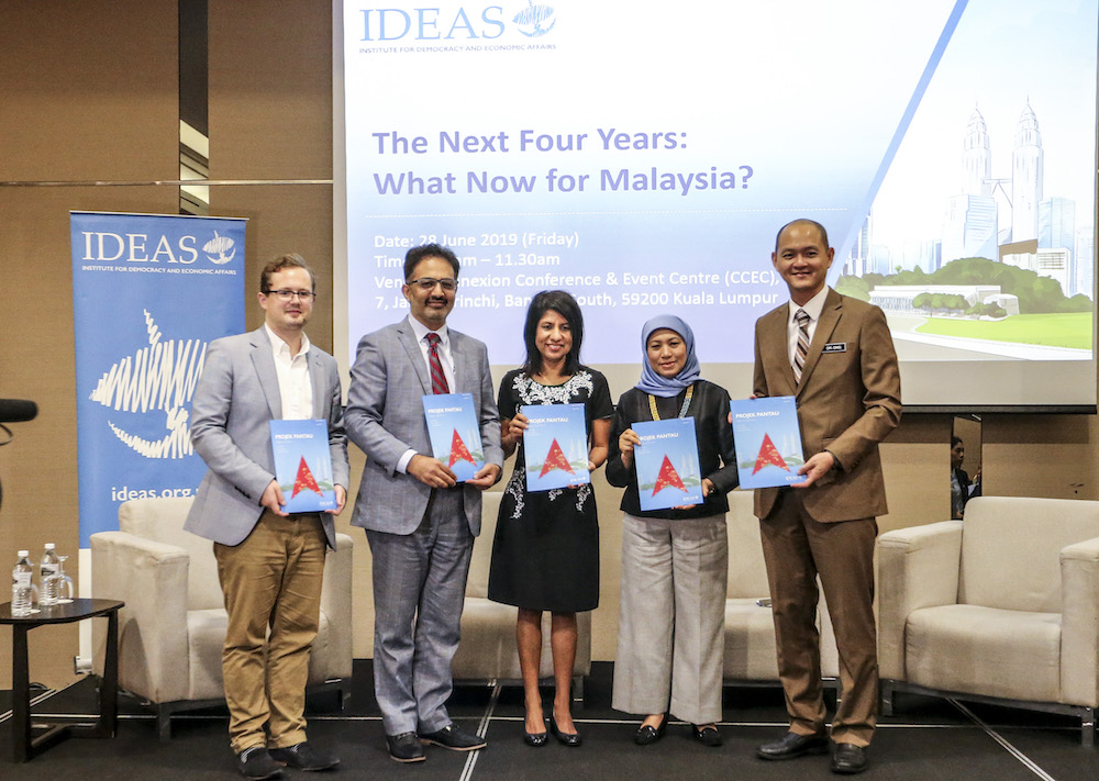 IDEAS director Laurence Todd, IDEAS CEO Ali Salman, C4 executive director Cynthia Gabriel, Datuk Seri Nancy Shukri and Ong Kian Ming pose for pictures in Kuala Lumpur June 28, 2019. u00e2u20acu201d Picture by Firdaus Latif