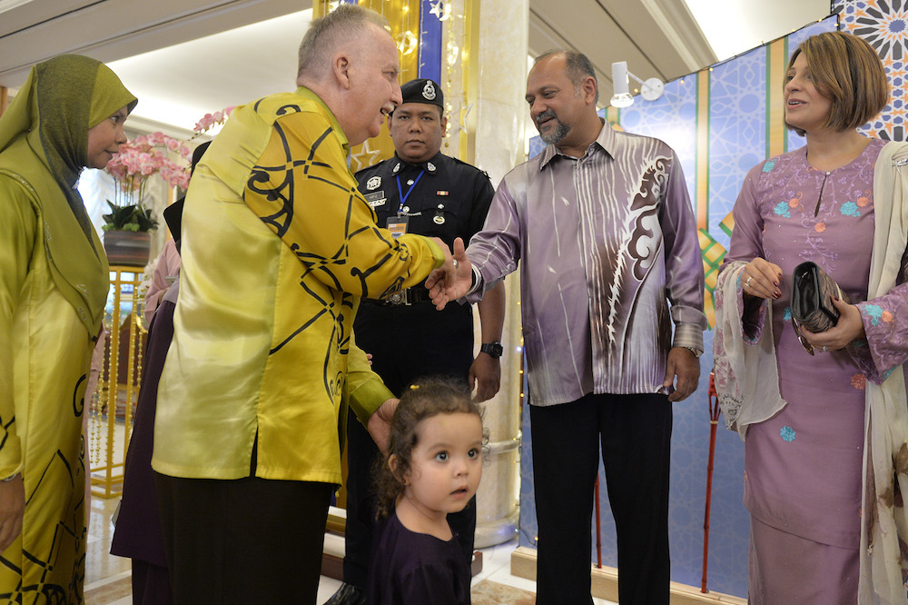 Multimedia and Communications Minister Gobind Singh Deo greets members of the public during the Prime Minister’s Raya Open House at Seri Perdana in Putrajaya June 5, 2019. — Picture by Mukhriz Hazim