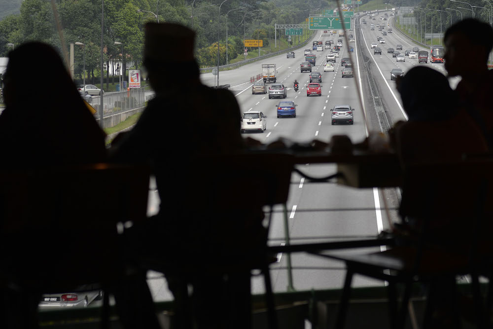 Traffic is seen along the North-South Expressway June 8, 2019, as viewed from the Sungai Buloh R&R. u00e2u20acu201d Picture by Mukhriz Hazim