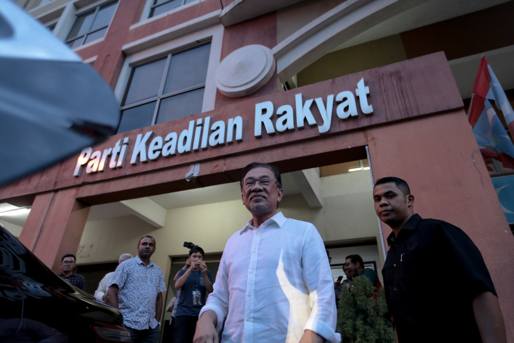 PKR president Datuk Seri Anwar Ibrahim leaves PKR headquarters in Petaling Jaya June 12, 2019. u00e2u20acu201d Picture by Ahmad Zamzahuri