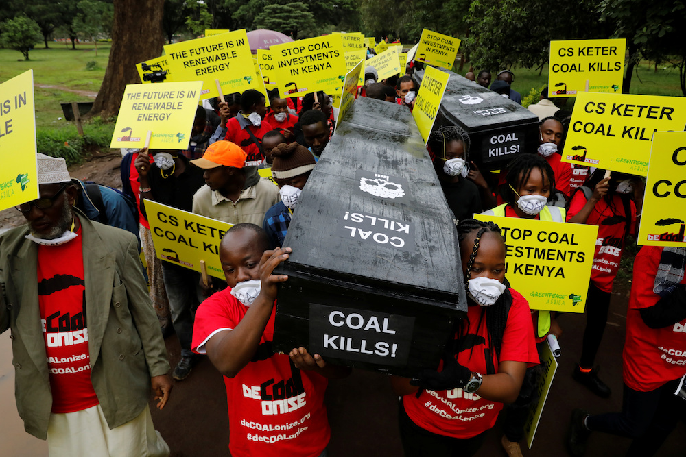 Greenpeace and environmental activists carry a coffin during a protest against the construction of a coal fired electricity plant in Lamu on Kenya's coast, during a protest in Nairobi June 12, 2019. u00e2u20acu201d Reuters picnn