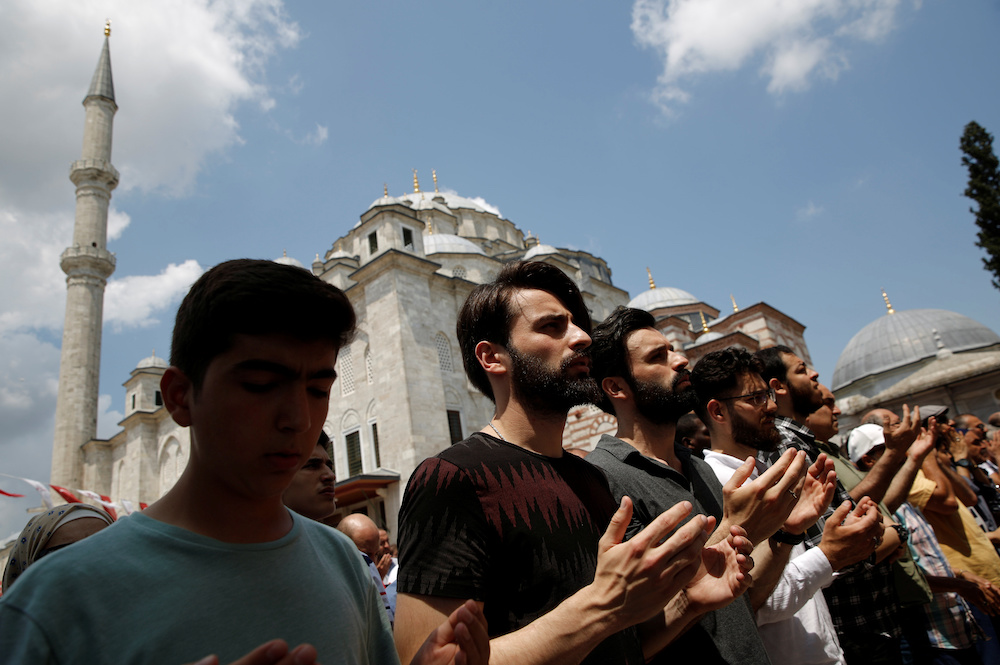 People attend a symbolic funeral prayer for the former Egyptian president Mohamed Mursi at the courtyard of Fatih Mosque in Istanbul June 18, 2019. u00e2u20acu201d Reuters picnn