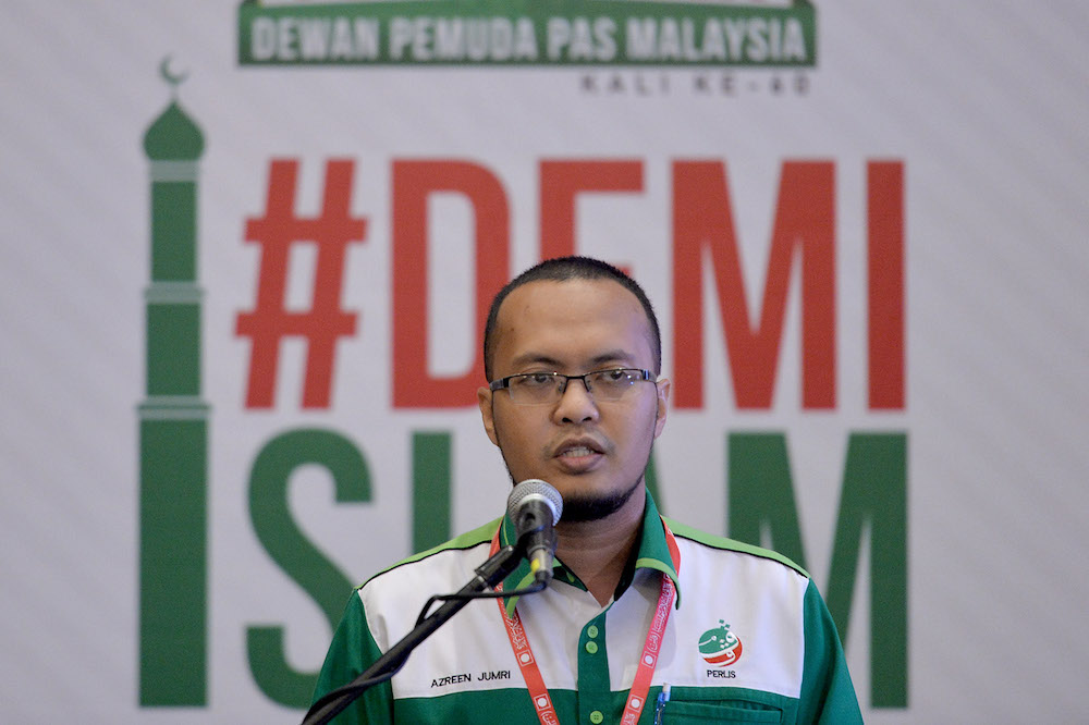 Perlis PAS Youth secretary Mohamad Azreen Jumri speaks during the Dewan Pemuda PAS Muktamar in Gambang, Pahang June 20, 2019. u00e2u20acu201d Picture by Mukhriz Hazim
