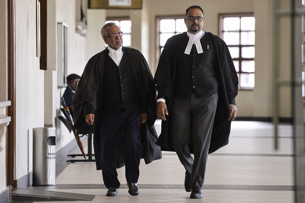 Datuk Seri Najib Razak’s defence lawyers, Tan Sri Muhammad Shafee Abdullah and Harvinderjit Singh, are seen at the Kuala Lumpur Courts Complex June 20, 2019. — Picture by Miera Zulyana
