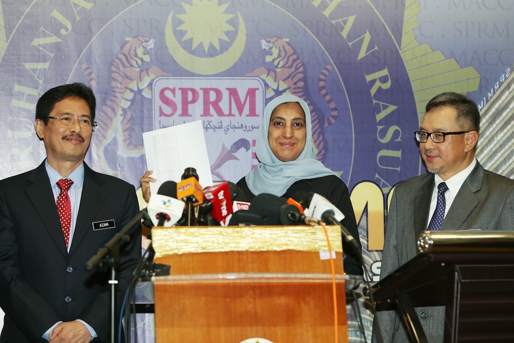 MACC chief commissioner Latheefa Koya addresses a press conference at MACC headquarters in Putrajaya June 21, 2019, as Datuk Seri Azam Baki (left) and Datuk Umar Saifuddin Jaafar look on. u00e2u20acu201d Picture by Choo Choy May