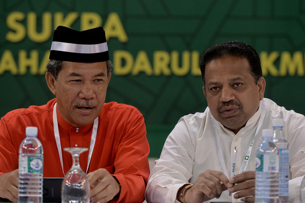 Datuk Seri Mohamad Hasan and Tan Sri SA Vigneswaran attend the 65th PAS Muktamar in Kuantan June 21, 2019. — Picture by Mukhriz Hazim
