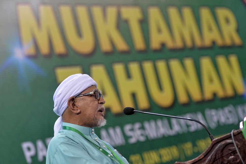 PAS President Datuk Seri Abdul Hadi Awang delivers his opening remarks during the 65th PAS Muktamar in Kuantan June 21, 2019. u00e2u20acu201d Picture by Mukhriz Hazim