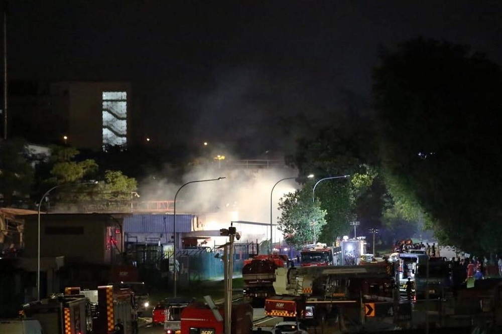 Firefighters battling the fire at No 43 Jalan Buroh, Singapore June 21, 2019. u00e2u20acu201d TODAY pic 