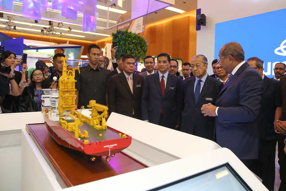 Tun Dr Mahathir Mohamed visits a booth during the opening of the Asia Oil and Gas Conference 2019 in Kuala Lumpur June 24, 2019. u00e2u20acu201d Picture by Yusof Mat Isa