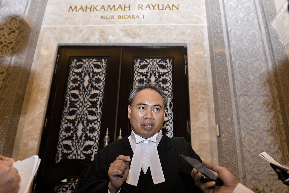 Lawyer Arham Rahimy Hariri speaks to reporters at the Court of Appeal in Putrajaya June 25, 2019. u00e2u20acu201d Picture by Miera Zulyana