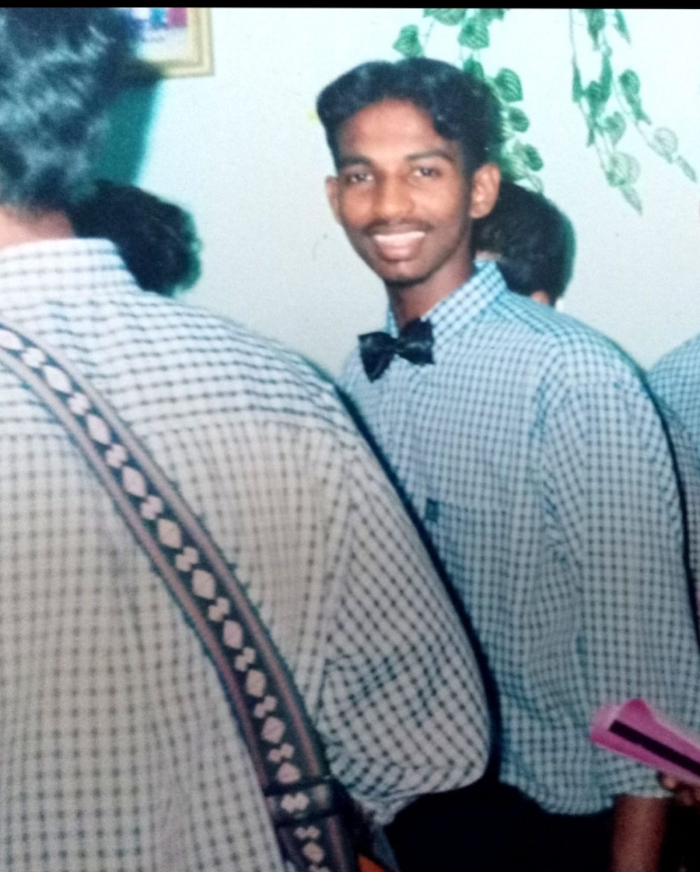 Pannir Selvam, seen here at age 19 during Christmas carolling, received a book titled ‘Dr Mahathir’s Selected Letters to World Leaders’. — Picture courtesy of Pannir Selvam’s family