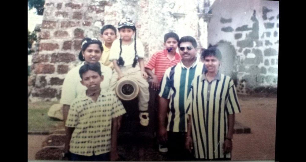 Pannir Selvam (front left), 11, with his family during an outing to Melaka. — Picture courtesy of Pannir Selvam’s family