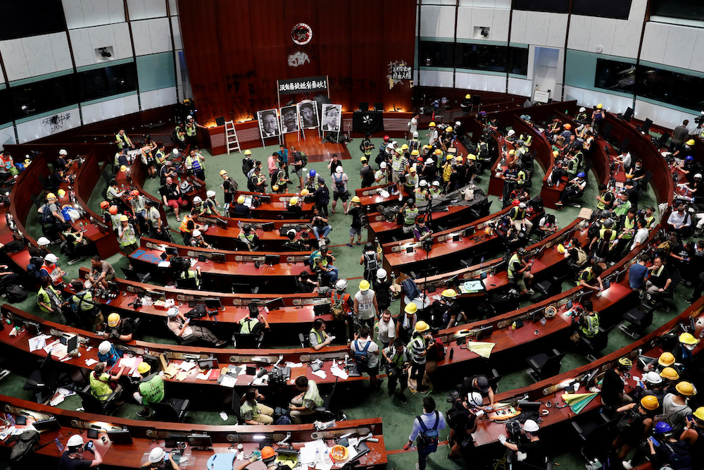 People are seen inside a chamber, after protesters broke into the Legislative Council building during the anniversary of Hong Kong's handover to China in Hong Kong July 1, 2019. u00e2u20acu201d AFP picnn