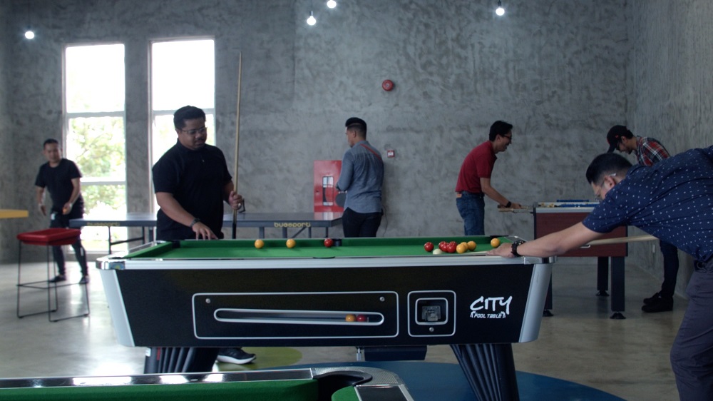 Employees can play some pool to recharge during the workday. — Picture courtesy of Employees Provident Fund
