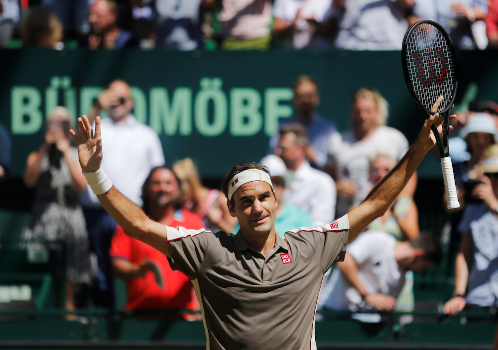Switzerlandu00e2u20acu2122s Roger Federer celebrates winning the final against Belgiumu00e2u20acu2122s David Goffin in Halle June 23, 2019. u00e2u20acu201d Reuters pic 