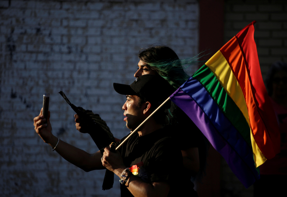 Members of the LGBT community carry a rainbow flag during a march in support of gay marriage, sexual and gender diversity in Ciudad Juarez, Mexico, June 10 2018. u00e2u20acu201d Reuters pic