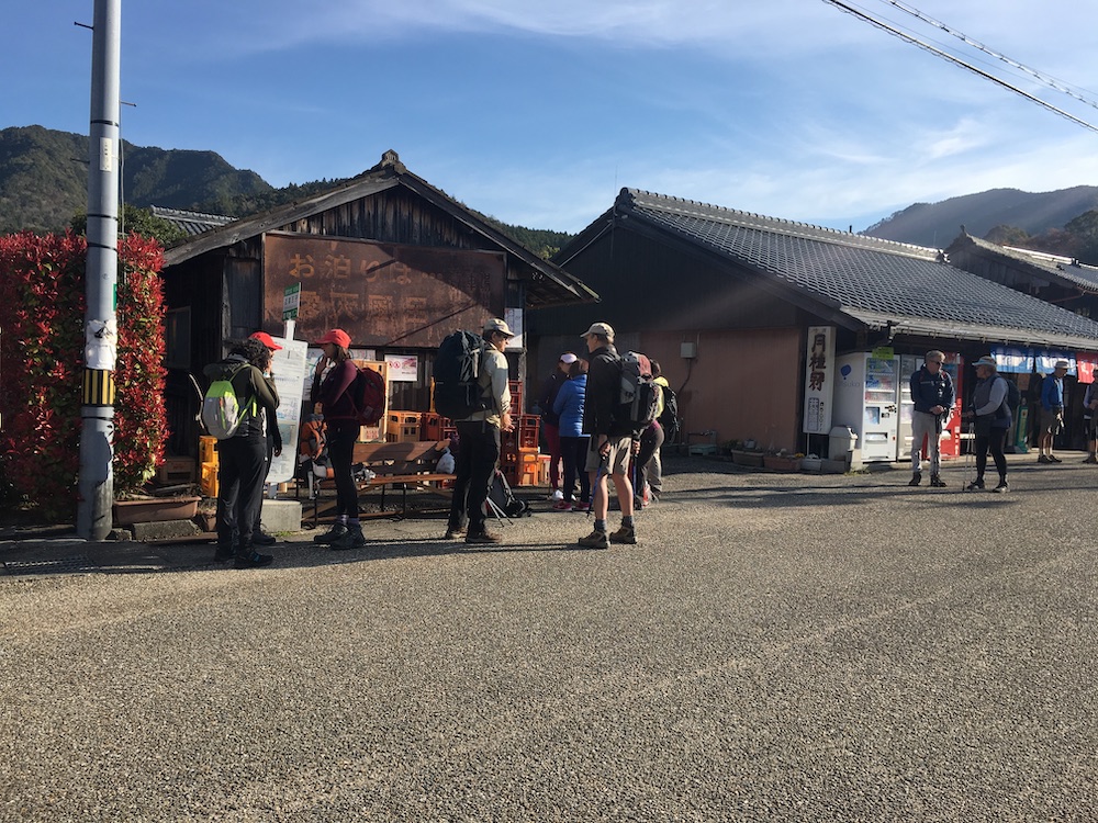 Hikers wait for a bus in Chikatsuyu village in Japan's Kumano region, April 19, 2019. — Thomson Reuters Foundation/Rina Chandran pic