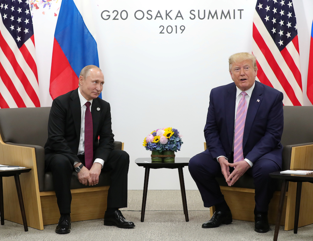 Russia's President Vladimir Putin and US President Donald Trump attend a meeting on the sidelines of the G20 summit in Osaka June 28, 2019. u00e2u20acu201d Sputnik/Mikhail Klimentyev/Kremlin handout via Reuters