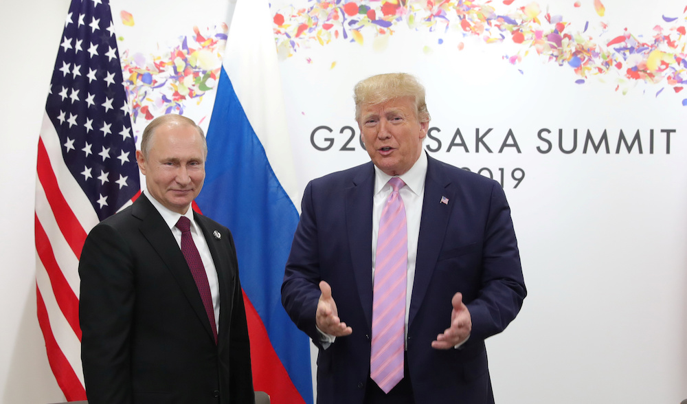 Russia's President Vladimir Putin and US President Donald Trump attend a meeting on the sidelines of the G20 summit in Osaka June 28, 2019. u00e2u20acu201d Sputnik/Mikhail Klimentyev/Kremlin handout via Reuters