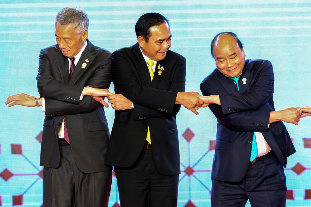Asean leaders shake hands on stage during the opening ceremony of the 34th Asean Summit at the Athenee Hotel in Bangkok, Thailand, June 23, 2019. u00e2u20acu201d Reuters pic