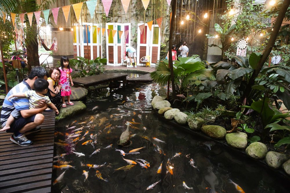 Families can spend quality time by the koi pond at 1 Utama’s Rainforest. — Picture by Choo Choy May
