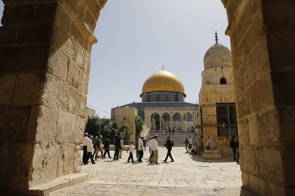 Israeli security forces escort a group of Jewish settlers visiting the al-Aqsa Mosque compound in the Old City of Jerusalem June 2, 2019, as Israelis mark Jerusalem Day. u00e2u20acu201d AFP pic 