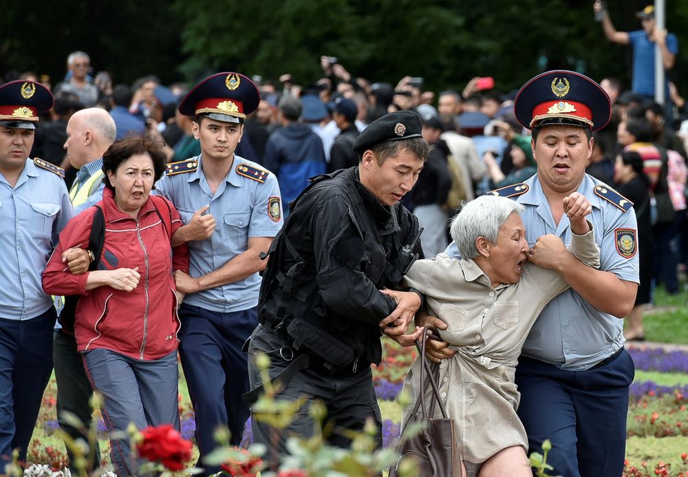 Police officers detain opposition supporters during a protest against presidential election, in Almaty, Kazakhstan, June 9, 2019. u00e2u20acu201d Reuters pic