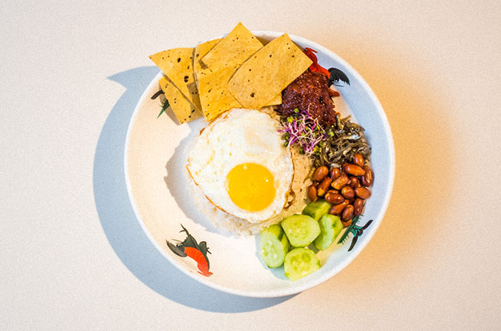 Get your taste of 'nasi lemak' with spicy 'sambal' at Agak Agak.