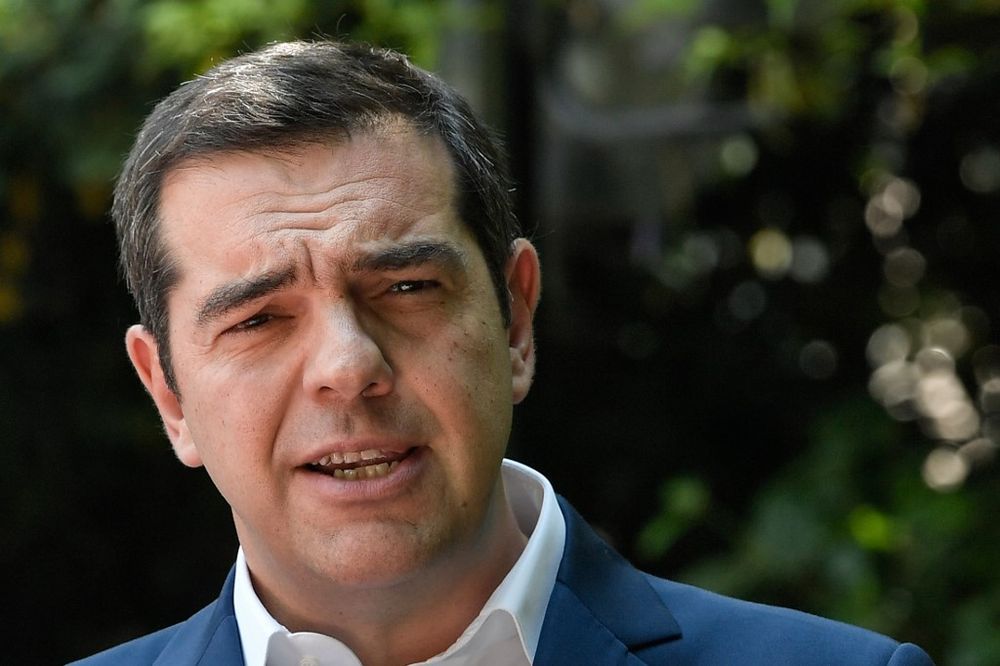 Greeceu00e2u20acu2122s prime minister Alexis Tsipras speaks to the press outside his office in Athens on June 6, 2019. u00e2u20acu201d AFP pic