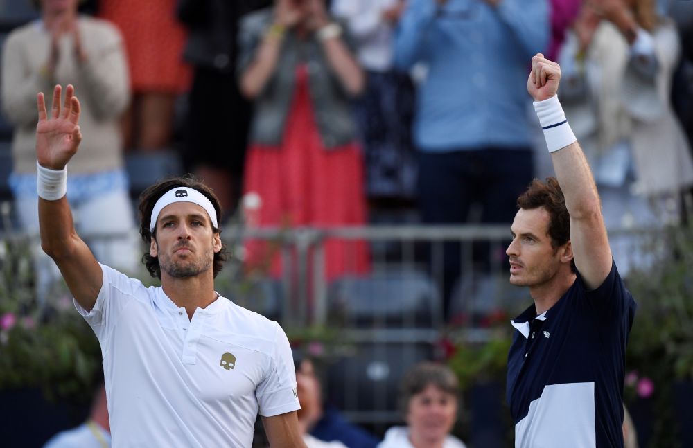 Britain's Andy Murray (right) and Spain's Feliciano Lopez celebrate after winning their semi final doubles match against Finland's Henri Kontinen and Australia's John Peers. u00e2u20acu201d Reuters pic