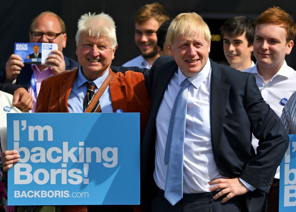 Britainu00e2u20acu2122s Conservative Party leadership candidate Boris Johnson and his father Stanley are seen at a hustings event, in Exeter, Britain, June 28, 2019. u00e2u20acu201d Reuters pic