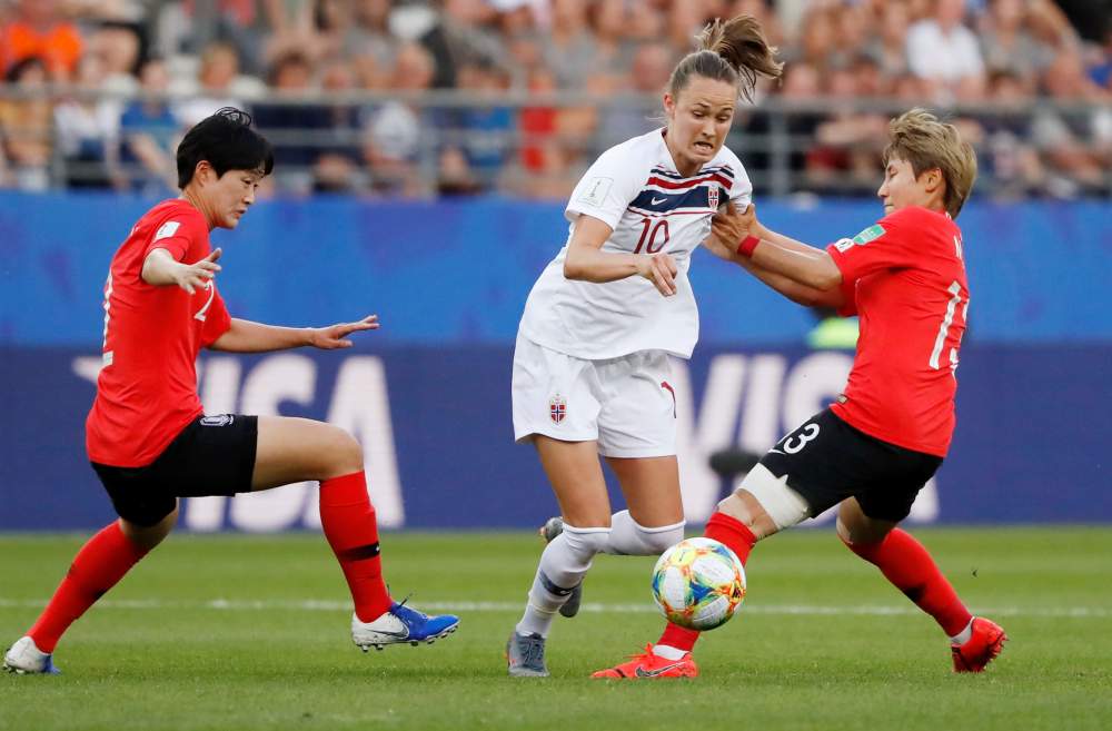 Norway's Caroline Graham Hansen in action with Korea Republic's Yeo Minji and Lee Eunmi during the Women's World Cup match in Reims, France June 17, 2019. u00e2u20acu2022 Reuters pic
