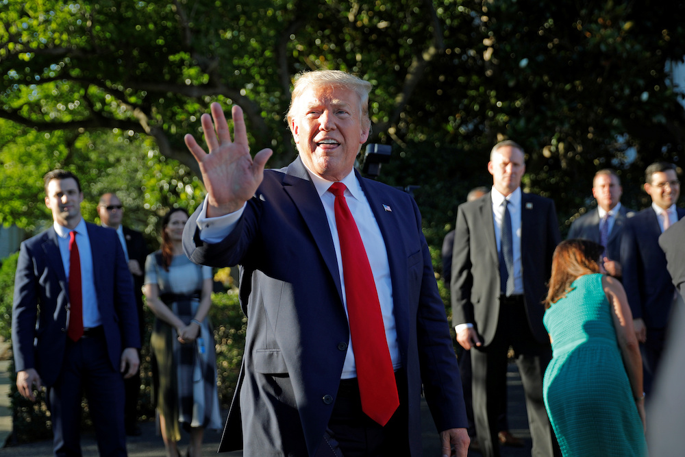 US President Donald Trump waves during the annual Congressional picnic event at the South Lawn of the White House in Washington, US, June 21, 2019. u00e2u20acu201d Reuters picnn