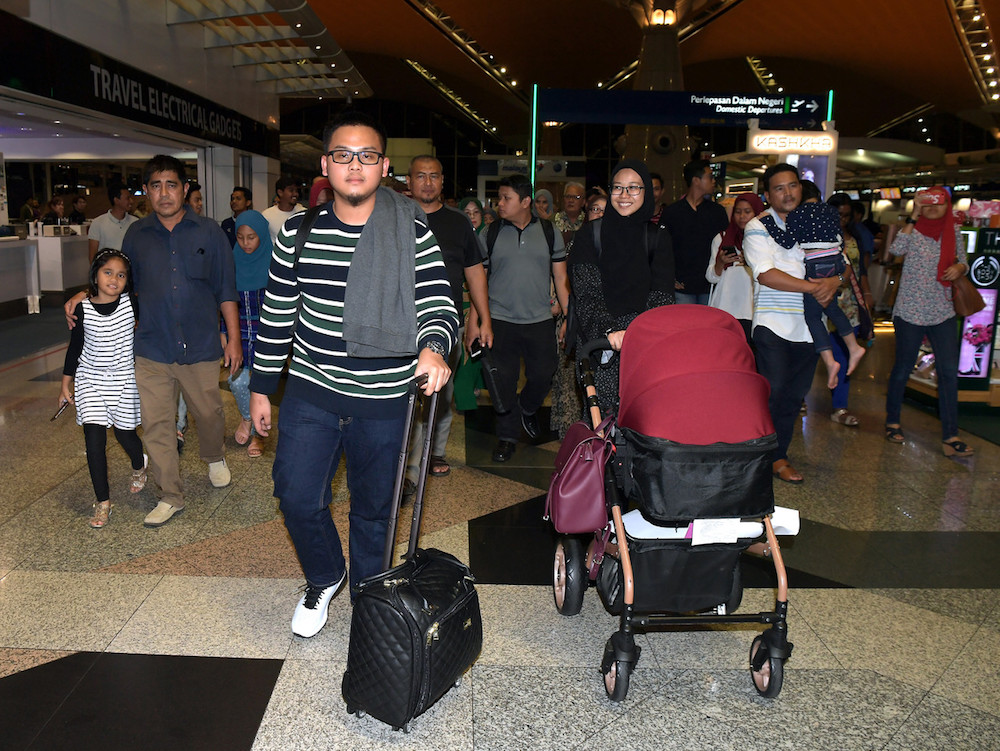 Ainul Mardhiah Ahmad Safiuddin leaves for London, accompanied by her parents Ahmad Safiuddin Ahmad Razak and Nurul Erwani Zaidi, at KLIA in Sepang May 24, 2019. u00e2u20acu201d Bernama pic