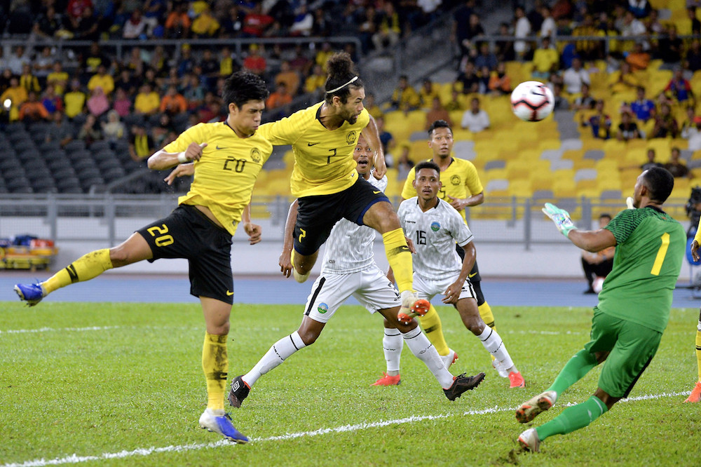 Malaysiau00e2u20acu2122s Corbin Ong Lawrence scores the first goal during their match with Timor Leste during the first leg of the 2022 World Cup/2023 Asian Cup first round qualifiers in Kuala Lumpur June 7, 2019. u00e2u20acu201d Bernama pic