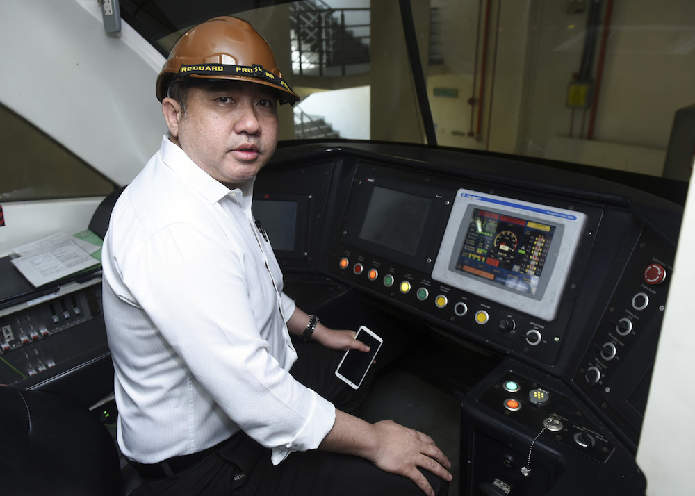 Transport Minister Anthony Loke poses for pictures during a visit to the Monorail Depot in Brickfields June 11, 2019. u00e2u20acu201d Bernama pic