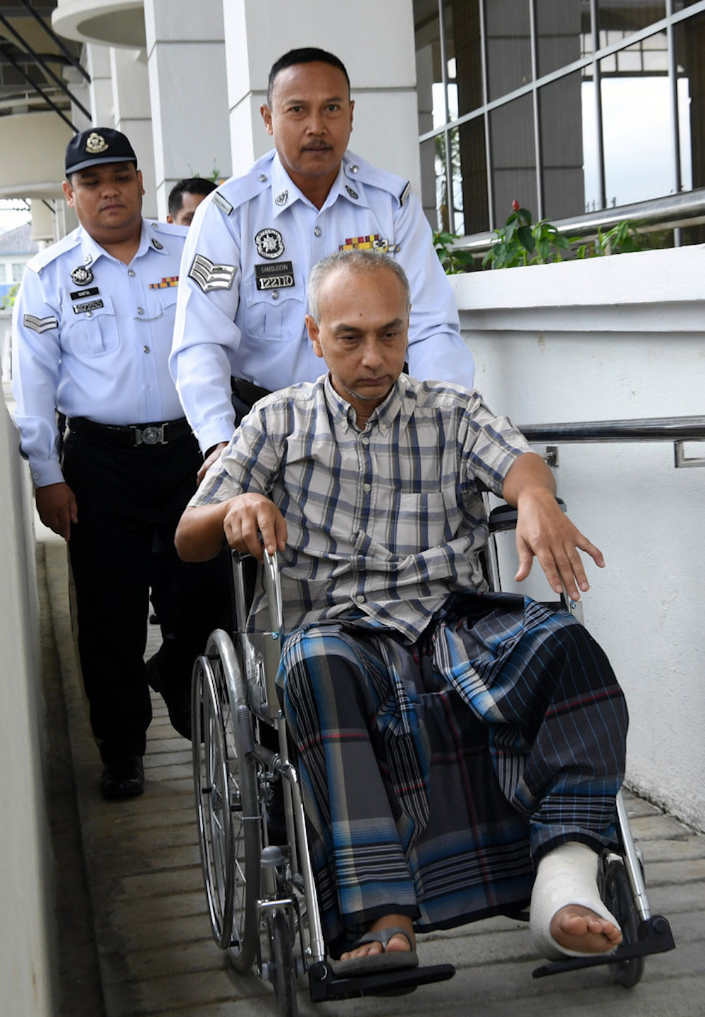 Othman Iberahim arrives at the Special Traffic Court in Seremban June 14, 2019. u00e2u20acu201d Bernama pic