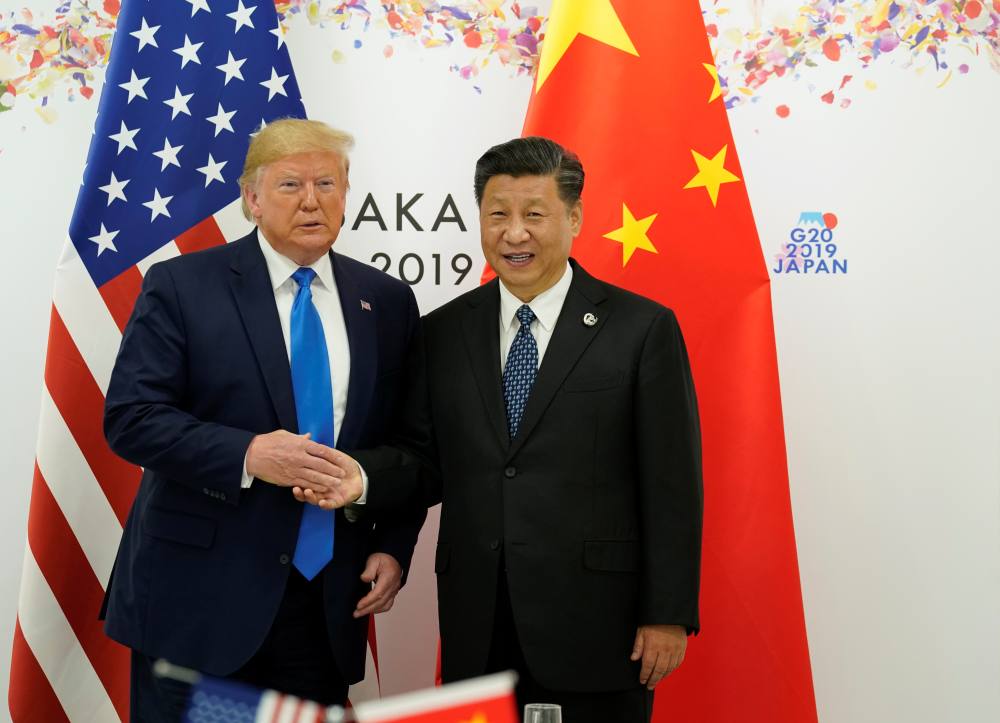 US President Donald Trump and China's President Xi Jinping pose for a photo ahead of their bilateral meeting during the G20 leaders summit in Osaka June 29, 2019. u00e2u20acu2022 Reuters pic