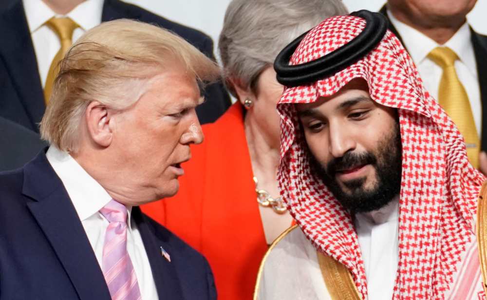 US President Donald Trump speaks with Saudi Arabia's Crown Prince Mohammed bin Salman during a photo session with other leaders and attendees at the G20 leaders summit in Osaka June 28, 2019. u00e2u20acu2022 Reuters pic