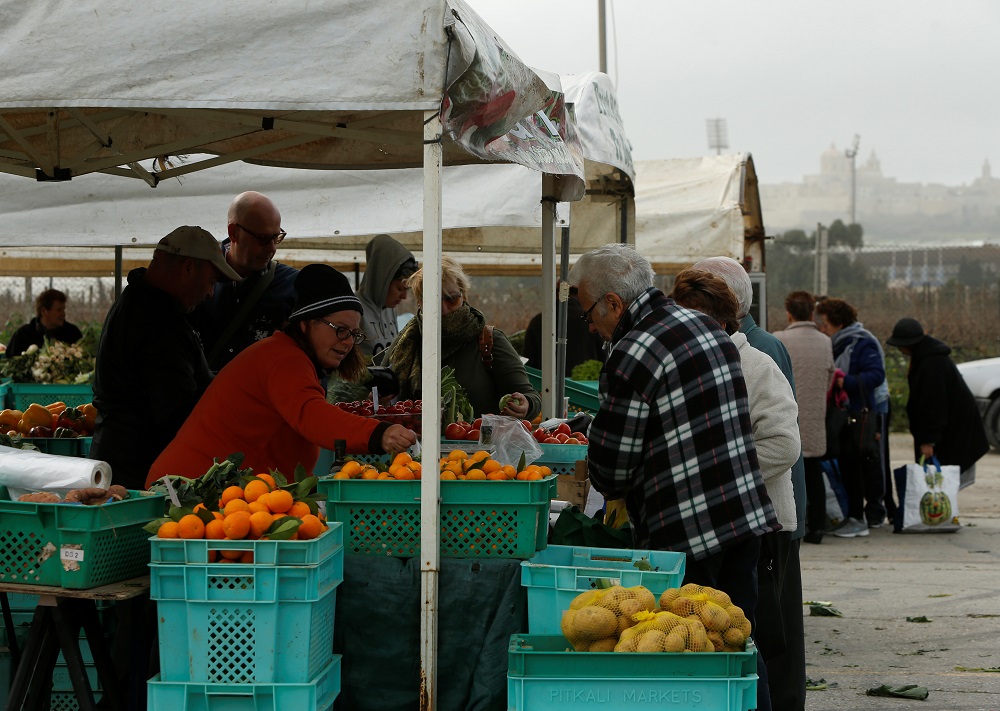 People buy fresh fruit and vegetables at the Farmers Market, where farmers can sell their fruit and vegetables directly to the public, in Ta' Qali, Malta February 6, 2018. u00e2u20acu201d Reuters pic       
