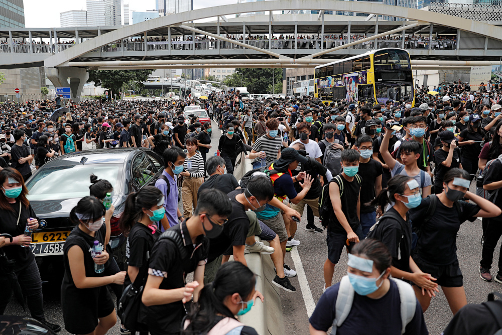 Protesters block a road during a demonstration demanding Hong Kongu00e2u20acu2122s leaders to step down and withdraw the extradition bill, in Hong Kong, China June 21, 2019. u00e2u20acu201d Reuters pic 