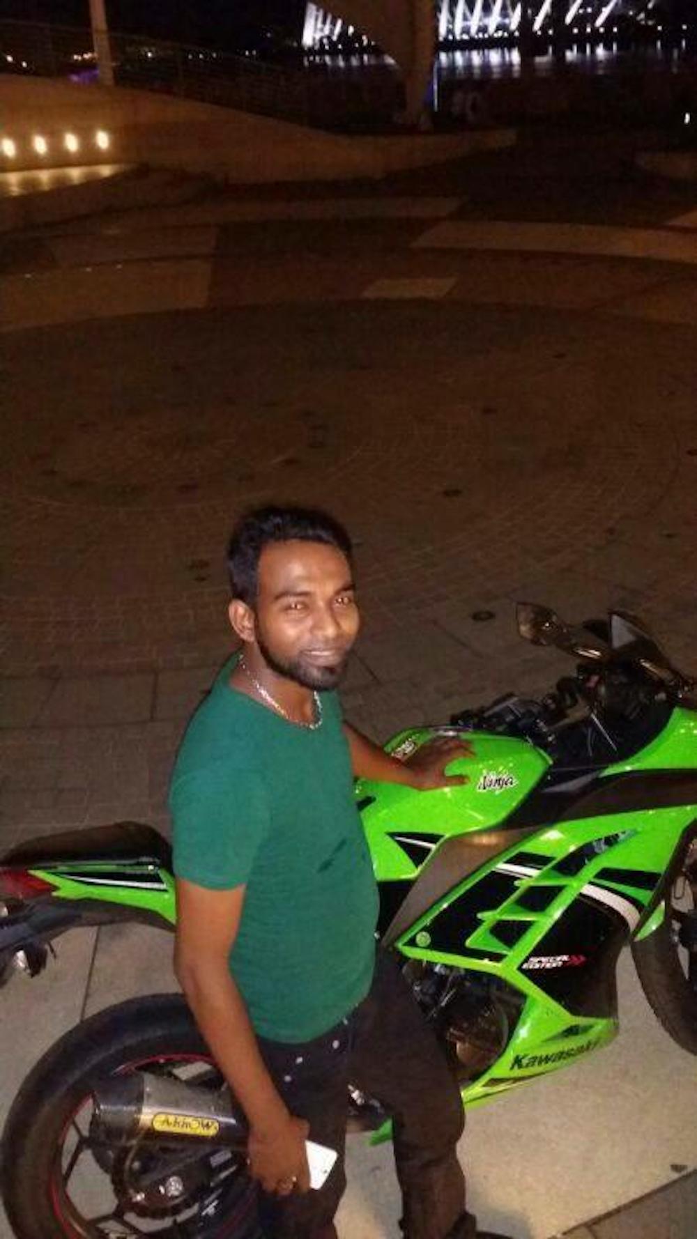 Manchester United fan and motorcycle enthusiast Pannir Selvam is seen here in May 2014 with his newly-purchased motorcycle which he used to visit his elder sister Sangkari. — Picture courtesy of Pannir Selvam’s family